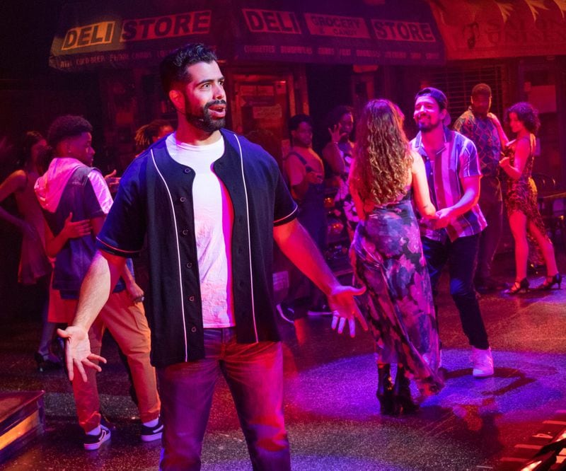 Marcello Audino (in foreground) heads the ensemble in City Springs Theatre’s production of the Lin-Manuel Miranda musical “In the Heights,” continuing through Nov. 6 at the Sandy Springs Performing Arts Center.
(Courtesy of City Springs Theatre/Mason Wood)