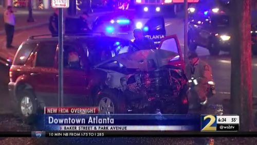 A police officer rescued a drunk driver from a fiery crash early Friday in downtown Atlanta, police said.