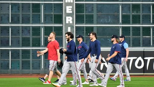 October 25, 2021 Houston, Texas - Atlanta Braves pitchers on the field during workout in preparation for Game 1 of baseball's World Series against Houston Astros at Minute Maid Park in Houston on Monday, October 25, 2021. (Hyosub Shin / Hyosub.Shin@ajc.com)