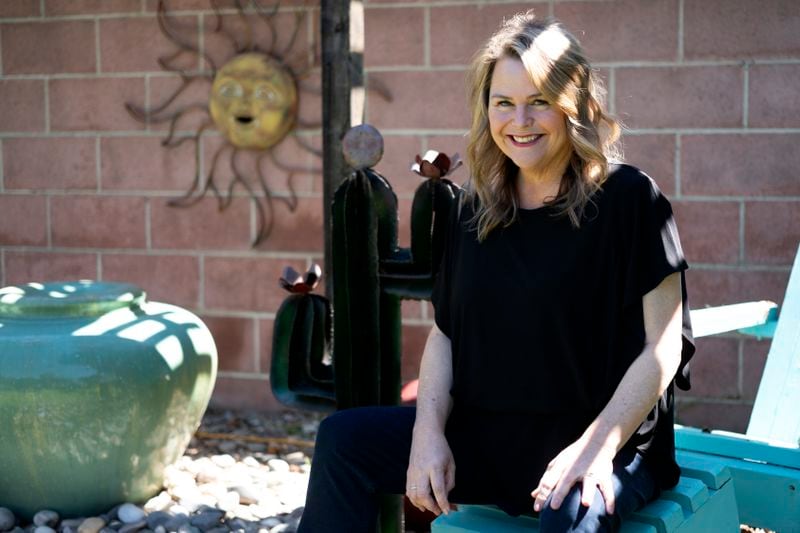 Actress and singer Lisa Donahey poses for a photo in her backyard in the Sherman Oaks section of Los Angeles on Tuesday, April 16, 2024. Donahey, 54, started Mounjaro under a doctor’s care a year ago to address her Type 2 diabetes. Her weight has since dropped to a little less than 190 pounds. Having used the medication to give her “a kick-start,” Donahey said she plans to wean herself off Mounjaro once she loses another 40 pounds. (AP Photo/Richard Vogel)