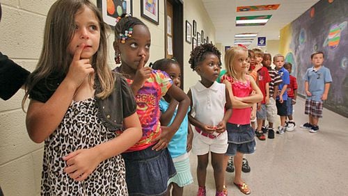 A guest columnist advocates for open enrollment, which allows K-12 students to transfer from one public school to another. While such policies exist in Georgia, they are often unclear to families. (John Spink / AJC file photo)