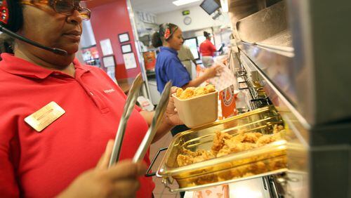 Popeyes workers at a location in Smyrna in 2012. (Photo by Joe Raedle/Getty Images)