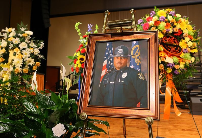 A portrait sits on the stage for the home-going service for Griffin police Officer Kevin “Shogun” Dorian Jordan, 43, at the Oak Hill Baptist Church on June 9, 2014. CURTIS COMPTON / CCOMPTON@AJC.COM
