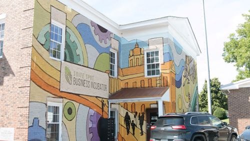 Sugar Hill’s Downtown Development Authority is seeking donations to bring second mural to the city’s Suite Spot. Courtesy Sugar Hill