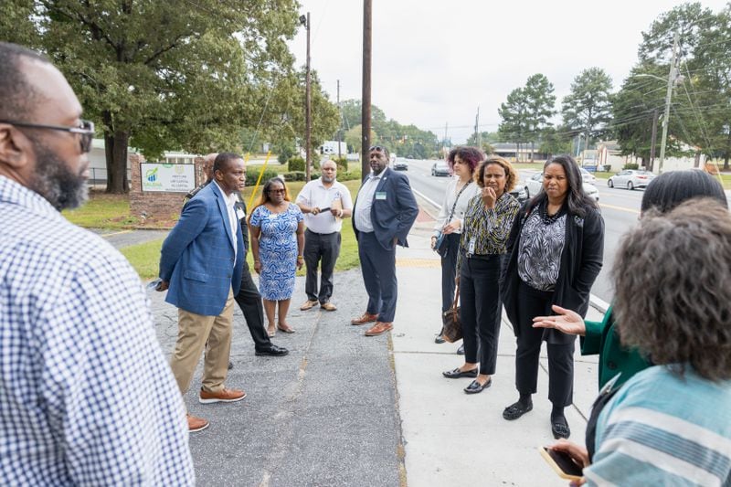 Participants in a tour of South Fulton development sites make a stop at one location along the Old National Highway corridor on Wednesday, Sept. 27, 2023. Image courtesy of The Collaborative Firm.