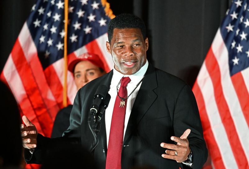 Republican U.S. Senate hopeful Herschel Walker tried to paint U.S. Sen. Raphael Warnock as a lackey of President Joe Biden, whose low approval rating in Georgia was a drag on the state's Democratic candidates. “Raphael Warnock votes with Joe Biden 96% of the time,” Walker said at campaign events, adding that he has “forgotten about the people of Georgia.” (Hyosub Shin / Hyosub.Shin@ajc.com)