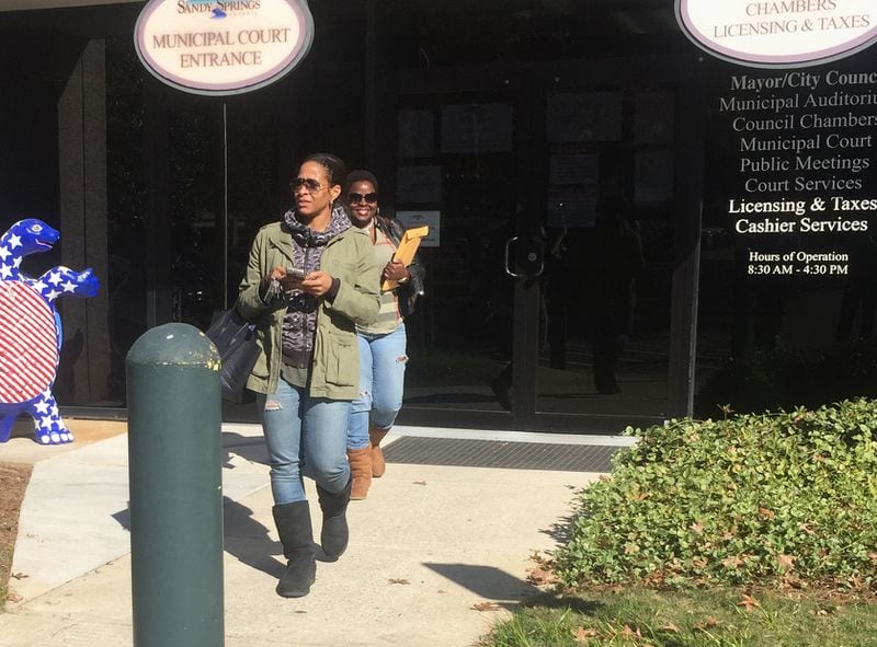 Sheree Whitfield has asked the court if she could leave through a back entrance to avoid the media. They said no. CREDIT: Rodney Ho/ rho@ajc.com