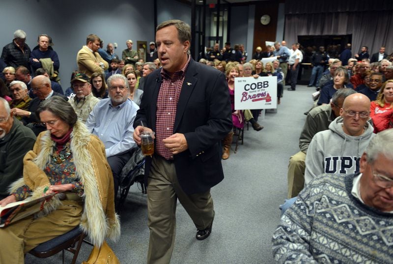 Cobb County Commissioner Bob Ott at a 2013 town hall meeting in Marietta. He questions DeKalb County commissioners’ decision on Feb. 27, 2018, to give themselves a 60 percent pay raise. (BRANT SANDERLIN / AJC file photo)