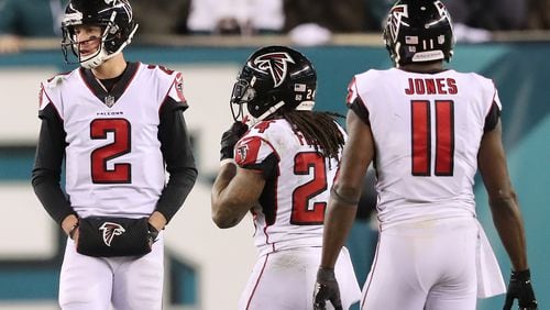 Matt Ryan, Devonta Freeman, and Julio Jones (seen here playing in Philadelphia back in January) will practice in one of their few open-to-the-public training camp sessions on Monday morning.     Curtis Compton/ccompton@ajc.com