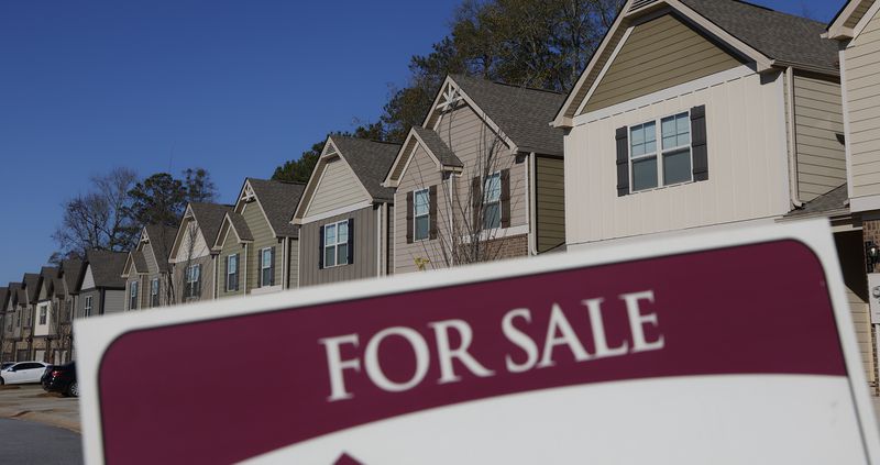 A home is advertised for sale in McDonough. Wall Street landlords are more than twice as likely to buy homes in African-American neighborhoods than majority white communities, an AJC analysis shows. (Natrice Miller/The Atlanta Journal-Constitution)