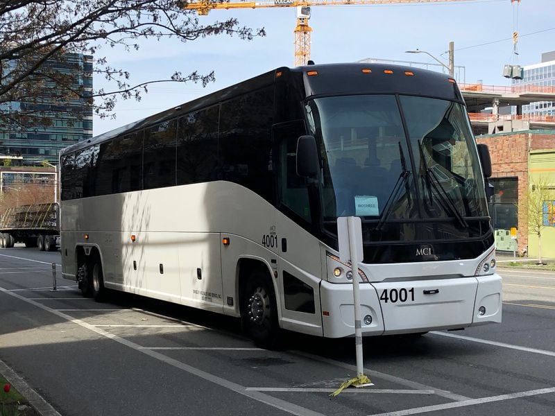 Amazon operates a fleet of unmarked buses like this one to help workers commute each day to its Seattle headquarters. J. Scott Trubey/strubey@ajc.com
