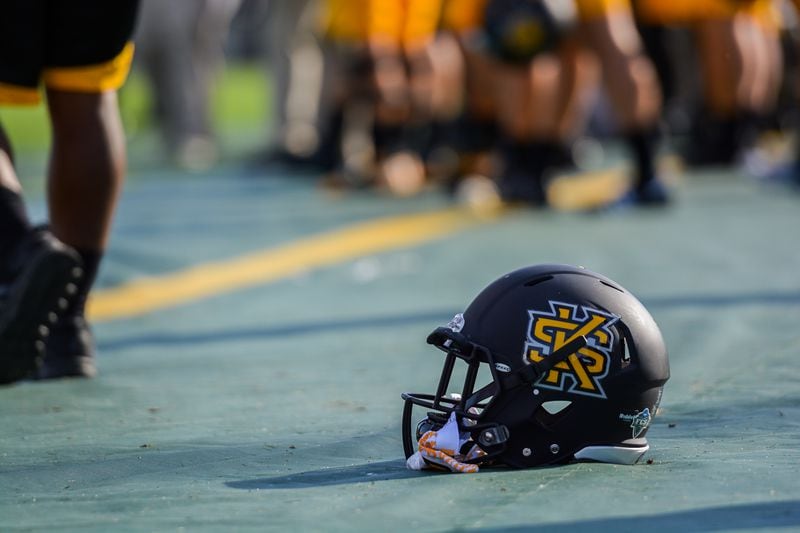 Kennesaw State wore their new matte black football helmets against Clark Atlanta after debuting them a week prior against Monmouth University, Saturday, Nov. 5, 2016. (Cory Hancock for the AJC)