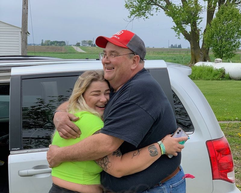 Jessica Gerling hugging her father, Larry Gerling, after a visit with the family in Iowa. (Courtesy of Gerling family)