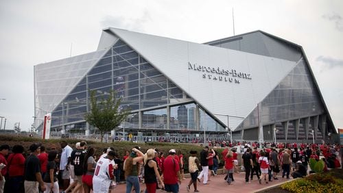 Mercedes-Benz Stadium, seen here in August, will host the 2018 College Football Playoff National Championship game on Jan. 8.  BRANDEN CAMP/SPECIAL