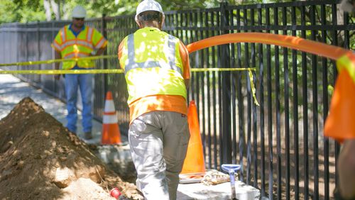 Contractors for Google work on installing fiber lines. The search engine giant plans to offer its Google Fiber 1-gig service in several metro Atlanta communities, including Smyrna, College Park, Atlanta and Avondale Estates.