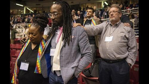 <p> Ed Rowe, left, Rebecca Wilson, Robin Hager and Jill Zundel, react to the defeat of a proposal that would allow LGBT clergy and same-sex marriage within the United Methodist Church at the denomination’s 2019 Special Session of the General Conference in St. Louis, Mo., Tuesday, Feb. 26, 2019. America’s second-largest Protestant denomination faces a likely fracture as delegates at the crucial meeting move to strengthen bans on same-sex marriage and ordination of LGBT clergy. (AP Photo/Sid Hastings) </p> <p> Adama Brown-Hathasway, left, The Rev. Dr. Jay Williams, both from Boston, and Ric Holladay of Kentucky join in prayer during the 2019 Special Session of the General Conference of The United Methodist Church in St. Louis, Mo., Tuesday, Feb. 26, 2019. America's second-largest Protestant denomination faces a likely fracture as delegates at the crucial meeting move to strengthen bans on same-sex marriage and ordination of LGBT clergy. (AP Photo/Sid Hastings) </p> <p> The Rev. Gary Graves, secretary of the General Conference, moderates a discussion during the 2019 Special Session of the General Conference of The United Methodist Church in St. Louis, Mo., Tuesday, Feb. 26, 2019. America's second-largest Protestant denomination faces a likely fracture as delegates at the crucial meeting move to strengthen bans on same-sex marriage and ordination of LGBT clergy. (AP Photo/Sid Hastings) </p> <p> The Rev. Gregory Palmer, west Ohio Bishop, speaks during the 2019 Special Session of the General Conference of The United Methodist Church in St. Louis, Mo., Tuesday, Feb. 26, 2019. America's second-largest Protestant denomination faces a likely fracture as delegates at the crucial meeting move to strengthen bans on same-sex marriage and ordination of LGBT clergy. (AP Photo/Sid Hastings) </p> <p> Sara Isbell joins other delegates at the 2019 Special Session of the General Conference of The United Methodist Church in St. Louis, Mo., Tuesday, Feb. 26, 2019. America's second-largest Protestant denomination faces a likely fracture as delegates at the crucial meeting move to strengthen bans on same-sex marriage and ordination of LGBT clergy. (AP Photo/Sid Hastings) </p>