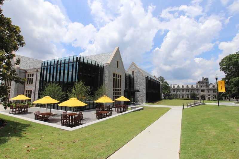 This is Oglethorpe University's Cousins Center, which is officially open. The 45,000 square foot glass and granite, state-of-the-art building features separate labs for biology, chemistry, physics, and ecology, as well as learning spaces for the Hammack School of Business in collaboration with Porsche Cars, N.A. and Global Payments. 