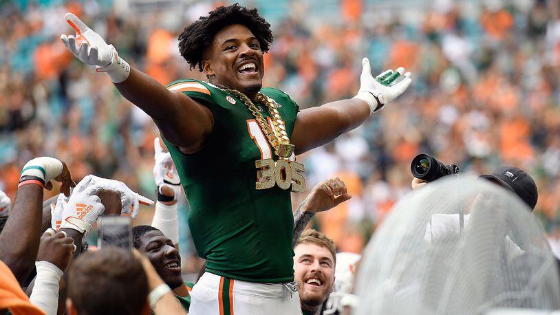 University of Miami defensive end Gregory Rousseau wears the turnover chain during a 2019 game against Central Michigan. (Michael Laughlin/Sun Sentinel/TNS)