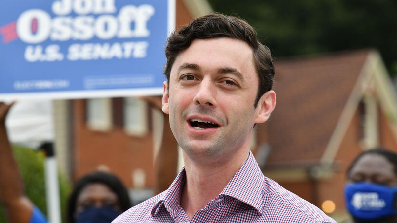 September 26, 2020 Stone Mountain - U.S. Senate candidate Jon Ossoff speaks to his supporters prior to a drive-thru, socially distanced, yard-sign pickup event hosted by the Georgia Federation of Democratic Women and the DeKalb Democratic Women’s groups in Stone Mountain on Saturday, September 26, 2020. Hyosub Shin / Hyosub.Shin@ajc.com)