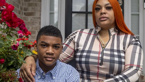 Joevania Riley and her only son Malachi Battle sit for a portrait at their residence in Grayson on May 18, 2021.  (Alyssa Pointer / Alyssa.Pointer@ajc.com)