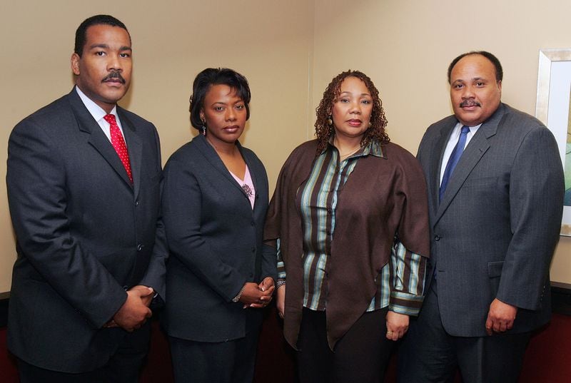 Coretta Scott King's children, Dexter Scott King, left to right, Rev. Bernice King, Yolanda King and Martin Luther King III pose for a photograph before a press availability at Paschals Restaurant in downtown Atlanta Sunday, Feb. 5, 2006. (AP Photo/Ric Feld)