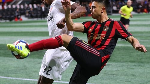 March 10, 2019 Atlanta: Atlanta United midfielder Pity Martinez is blocked out by FC Cincinnati defender Alvas Powell in front of the goal during the second half in their MLS soccer match on Sunday, March 10, 2019, in Atlanta.    Curtis Compton/ccompton@ajc.com