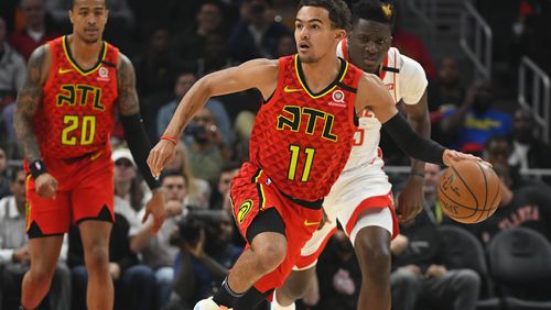 Atlanta Hawks guard Trae Young (11) races upcourt during the first half of an NBA basketball game against the Houston Rockets, Wednesday, Jan. 8, 2020, in Atlanta. (AP Photo/John Amis)