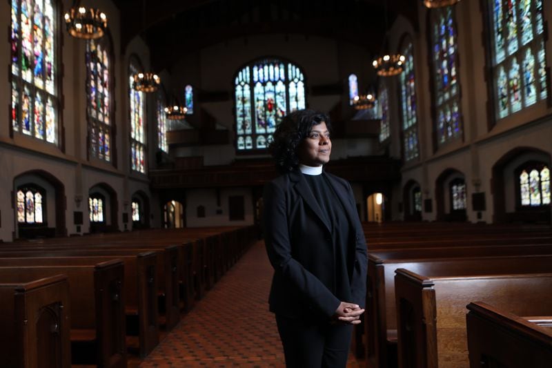 Reverend Winnie Varhese from Saint Luke's Episcopal in Atlanta poses for a photograph in the church's chapel on Wednesday, May 11, 2022. In addition, faith community leaders, or non-ordained in their faith communities, have provided moral leadership, especially to women seeking women's advice.