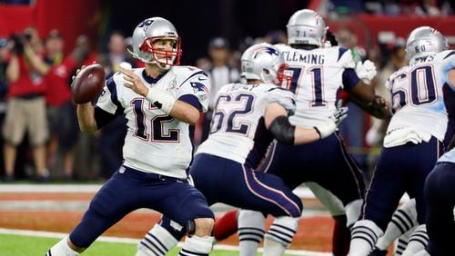 New England Patriots quarterback Tom Brady (12) prepares to pass against the Atlanta Falcons in the Super Bowl, Feb. 5, 2017, in Houston.