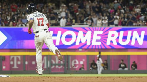 Johan Camargo approaches second base on a two-run home run to left center against the Miami Marlins, Saturday, Sept. 9, 2017, in Atlanta. (AP Photo/John Amis)