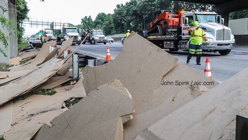 Crews worked Tuesday morning to move spilled sheets of plywood from the eastbound lanes of I-20 off to the shoulder. The cleanup blocked multiple right lanes and caused big backups through Fulton and Cobb counties for hours.