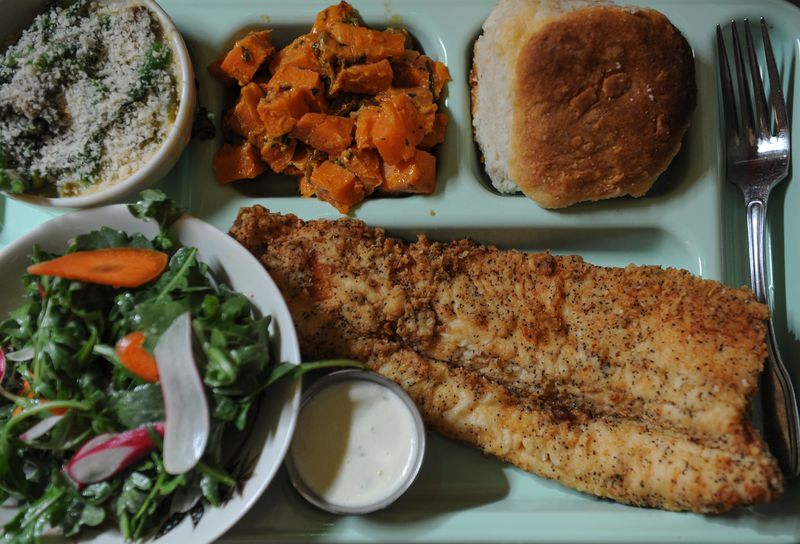 Fried Trout meat-and-three with side salad, curry sweet potato salad, broccolini casserole and a biscuit.(Beckysteinphotography.com)