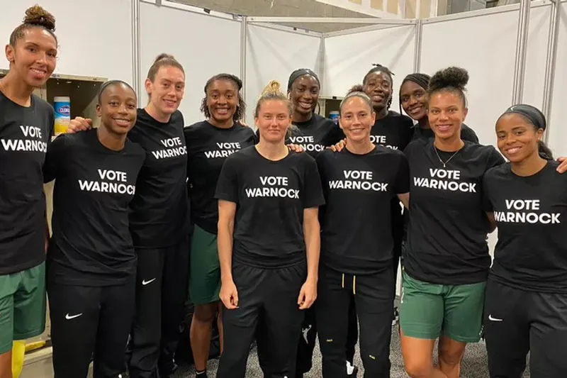 Dozens of WNBA players wore "Vote Warnock" T-shirts in August to protest U.S. Sen. Kelly Loeffler's criticism of Black Lives Matter. Twitter/Sue Bird.