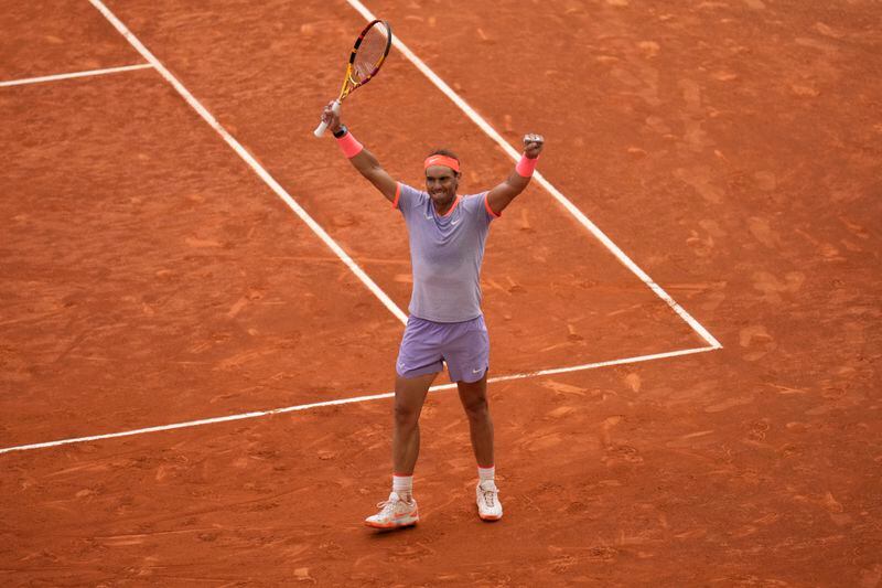 Rafael Nadal of Spain celebrates after defeating Pedro Cachin of Argentina during the Mutua Madrid Open tennis tournament in Madrid, Spain, Monday, April 29, 2024. (AP Photo/Manu Fernandez)