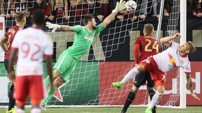 MARCH 5, 2017 Atlanta, Atlanta United goalkeeper Alec Kann tried to reach the ball on a play that the New York Red Bulls scored the first goal. (Miguel Martinez)