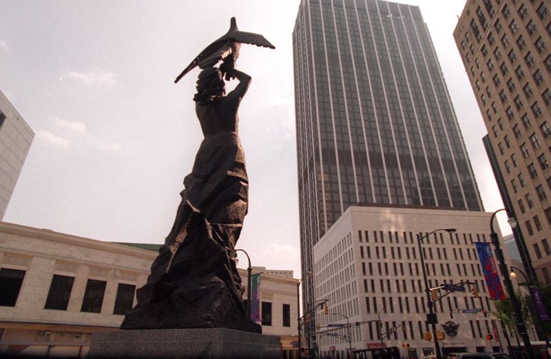 Artful Five Points. The stately lady personifying 'Atlanta from the Ashes,' which once stood on Martin Luther King Jr. Drive at Rich's, now makes the south entrance to Woodruff Park. (AJC Staff Photo/Erick Williams) June/1996