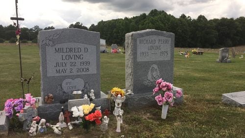 The graves of Richard and Mildred Loving are seen in a rural cemetery near their former home in Caroline County, Virginia, Wednesday, June 7, 2017. Richard Loving, a white man, and his wife Mildred, a black woman, challenged Virginias ban on interracial marriage and ultimately won their case at the U.S. Supreme Court in 1967. Monday, June 12, 2017 marks 50 years since the Supreme Court issued that opinion, which overturned laws against interracial marriage in 16 states.  (AP Photo/Jessica Gresko)