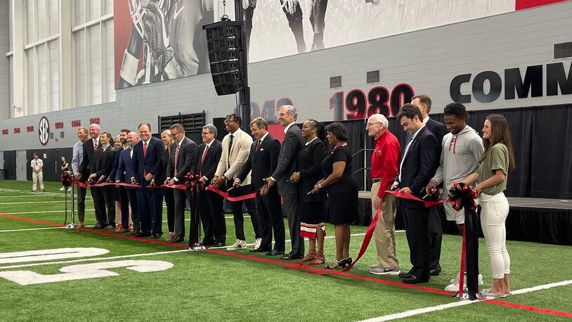 Georgia coach Kirby Smart, football player Nolan Smith and President Jere Morehead were among several dignitaries who cut the ribbon during a dedication ceremony of the Bulldogs' new football operations addition at the Butts-Mehre Football Complex on Tuesday, May 17, 2022. (Photo by Chip Towers/ctowers@ajc.com)