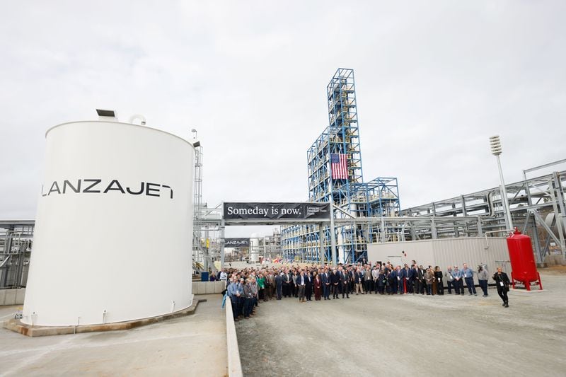 LanzaJet executives, employees, and special guests who traveled from several countries pose for a photograph beside the fuel tanks at the Plant in Soperton, GA, on Wednesday, January 24, 2024. LanzaJet is the world’s first and only ethanol-to-sustainable aviation fuel (SAF) production facility. Miguel Martinez /miguel.martinezjimenez@ajc.com