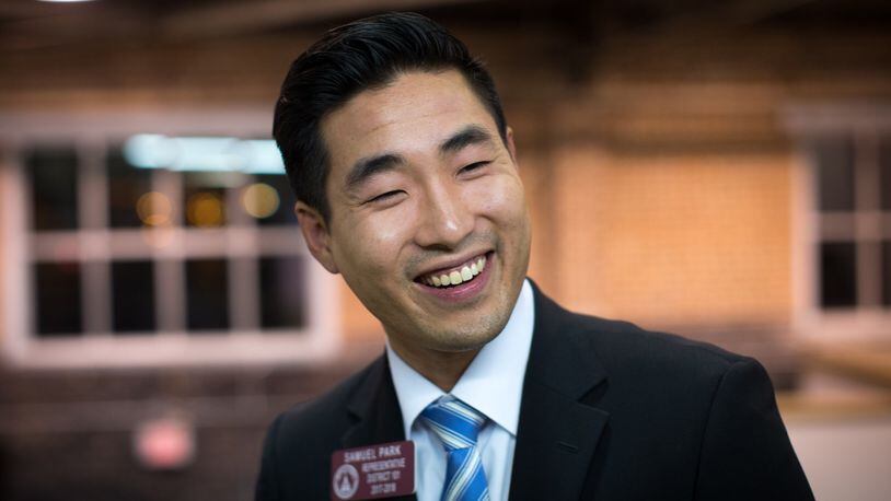 Sam Park, the first openly gay man to be elected to Georgia’s General Assembly, celebrates during a victory party. Park, a newly elected member to the state House from Gwinnett County, is also the only Asian-American serving in the Legislature. Branden Camp/Special