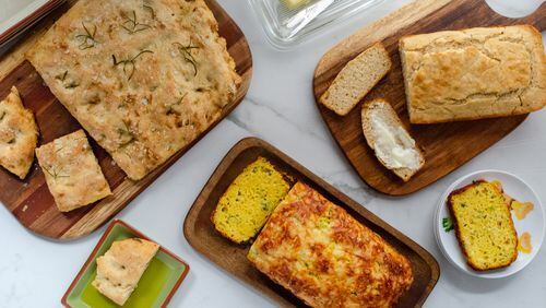 These quick breads can be made, baked and on the table in under an hour: (from left) Quick Bread Focaccia, Savory Yogurt Loaf and Beer Bread. (Virginia Willis for The Atlanta Journal-Constitution)