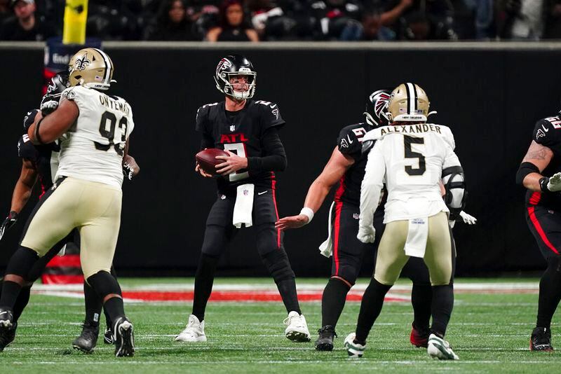 Falcons quarterback Matt Ryan works in the pocket against the Saints last season. Ryan has never had a weak wide receiver crew. The position has been well-stocked with first-rounders for most of his career. (AP Photo/John Bazemore)