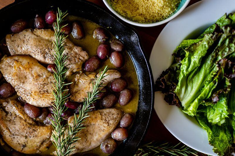 “Roast” Chicken with Grapes and Rosemary. Henri Hollis/For The AJC