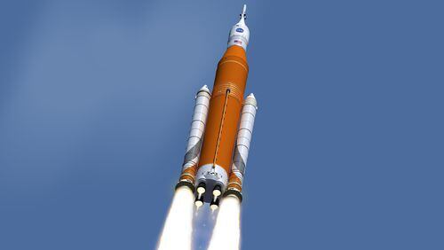 This image made available on Feb. 15, 2017 by NASA shows an artist’s concept of the launch of the Space Launch System rocket and Orion capsule. On Friday, Feb. 24, 2017, NASA said it is weighing the risk of adding astronauts to the first flight of its new megarocket. (NASA/Marshall Space Flight Center via AP)
