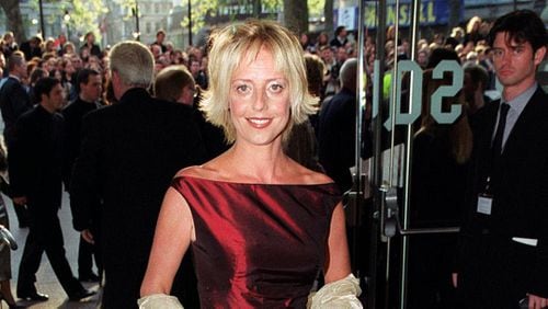 In this file photo dated April 27, 1999, British actress Emma Chambers on the des carpet in London. The actress, known for her roles in the TV series "The Vicar of Dibley" and the movie "Notting Hill," has died of natural causes at the age of 53, according to an announcement from her agent John Grant, on Saturday Feb. 24, 2018. (Peter Jordan/PA FILE via AP)