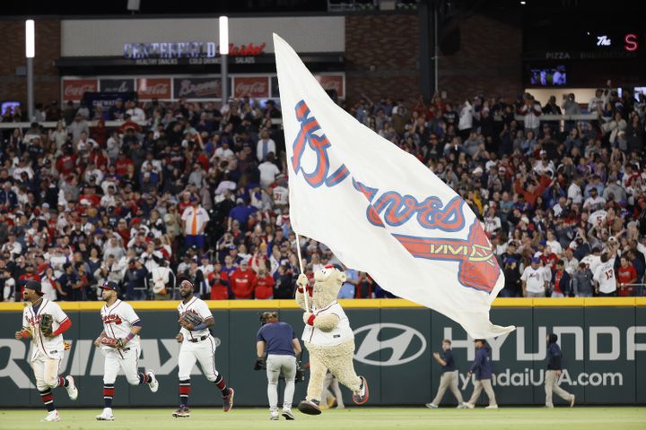 Braves mascot Blooper waves a flag after a 4-2 victory over the New York Mets 4-2 at Truist Park on Saturday, Oct. 1, 2022. Miguel Martinez / miguel.martinezjimenez@ajc.com