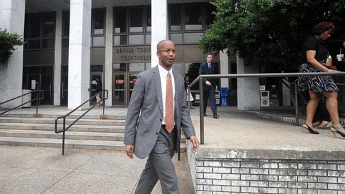 DeKalb County District Attorney Robert James leaves the the courthouse after DeKalb County CEO Burrell Ellis was found guilty on four counts in his retrial July 1, 2015. The Georgia Supreme Court overturned Ellis’ conviction Nov. 30, 2016. KENT D. JOHNSON /KDJOHNSON@AJC.COM