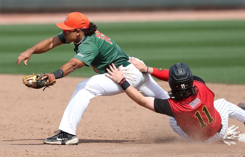 Grambling State infielder Caleb Clines is caught in a force out at second base by Florida A&M second baseman Octavien Moyer during the sixth inning of the HBCU Baseball Classic final Sunday, March 14, 2021, at Coolray Field in Lawrenceville. (Curtis Compton / Curtis.Compton@ajc.com)