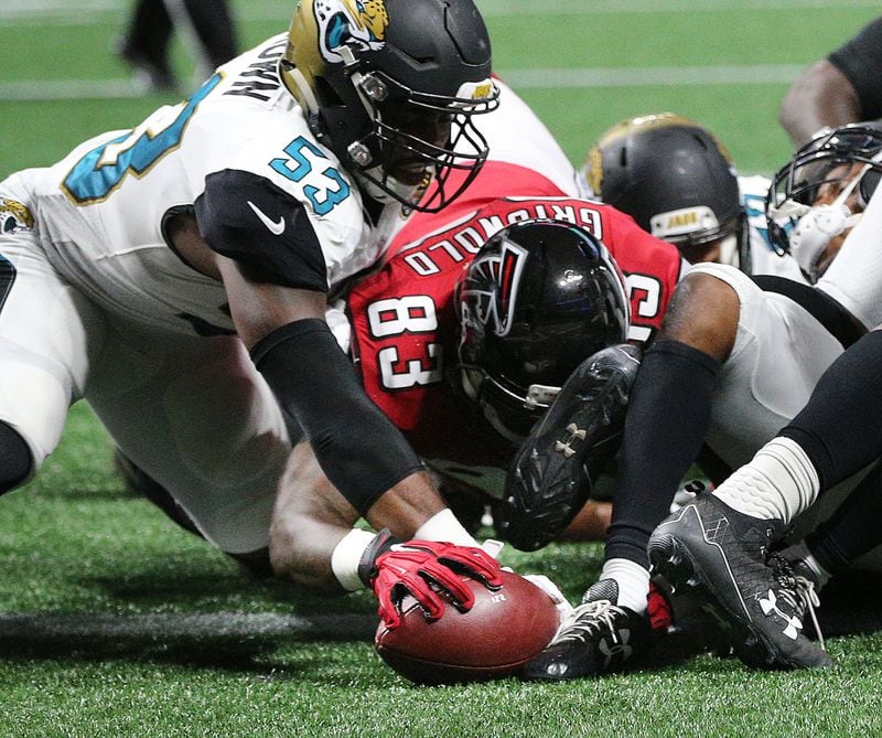 August 31, 2017 Atlanta: Falcons (83) Darion Griswold recovers a fumble into the endzone by running back Jhurrell Pressley during the 4th quarter for their only score against the Jaguars Blair Brown in a NFL preseason football game on Thursday, August 31, 2017, in Atlanta.  Curtis Compton/ccompton@ajc.com