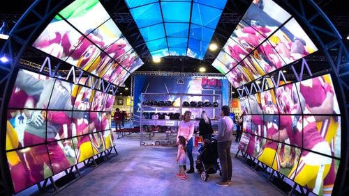 People look over one of the many displays during the Super Bowl Experience at the World Congress Center In Atlanta on Sunday, January 27, 2019. (Photo: STEVE SCHAEFER / SPECIAL TO THE AJC)